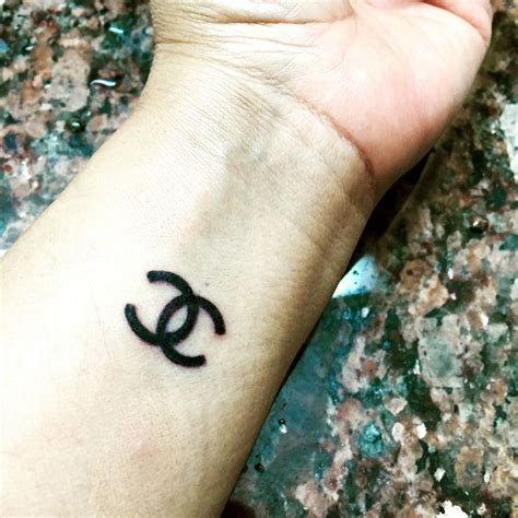 chanel cy tattoo|chanel symbol tattoo designs.